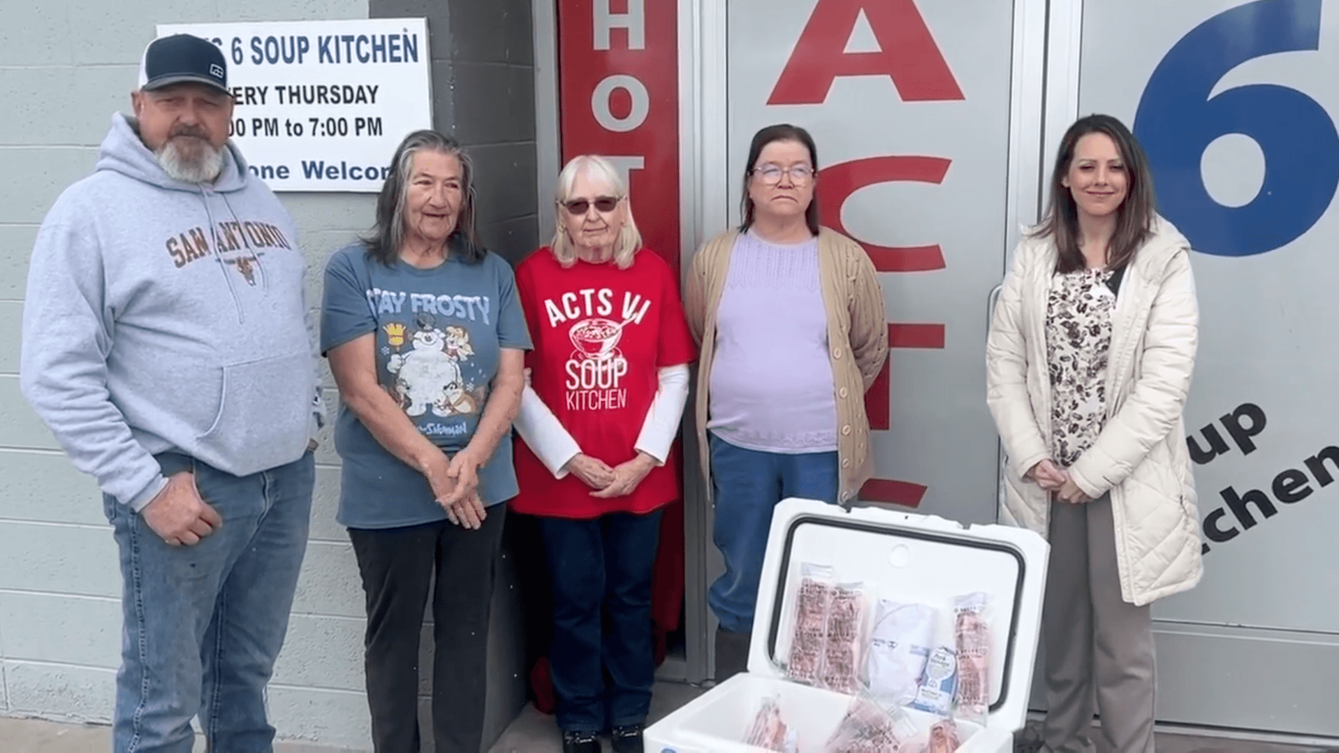 soup kitchen board members with Miracle Ag, Utah Farm Bureau, and FFA Students check